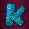 golden mayan k symbol