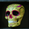 los muertos yellow skull symbol